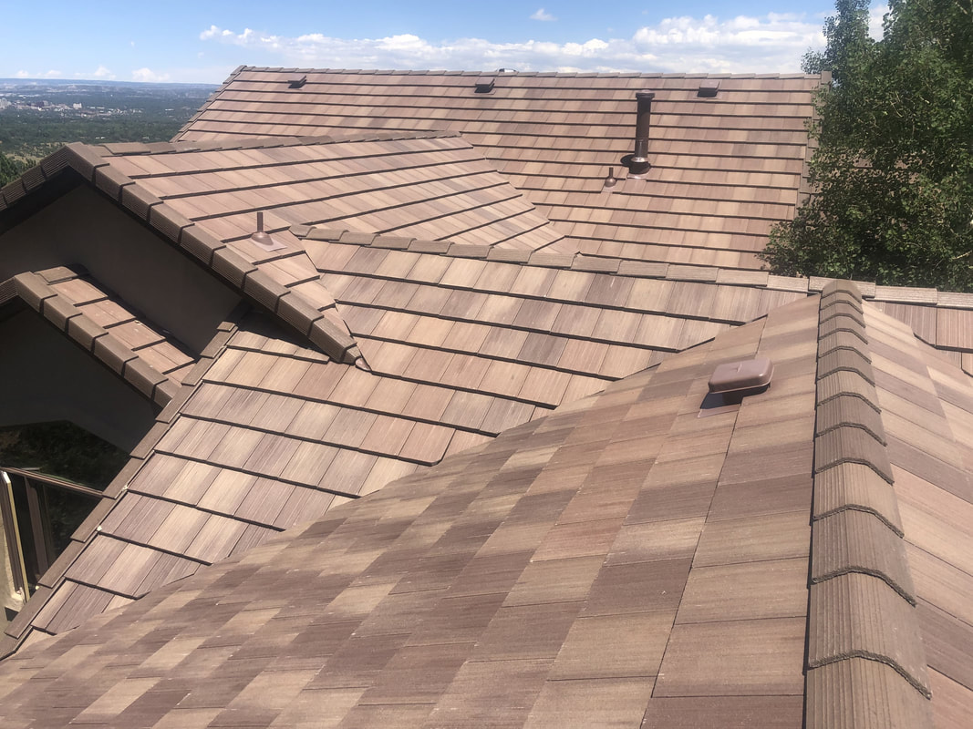 New brown shingles on a roof